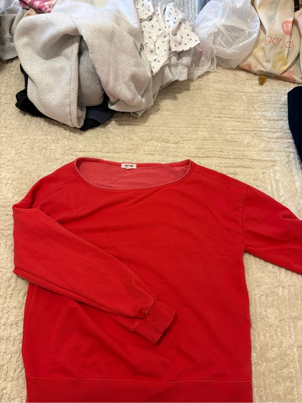 Red off the shoulder sweatshirt